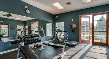 fitness center with pool deck access - Photo Gallery 11
