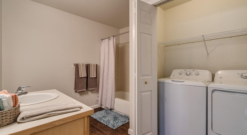bathroom with washer and dryer