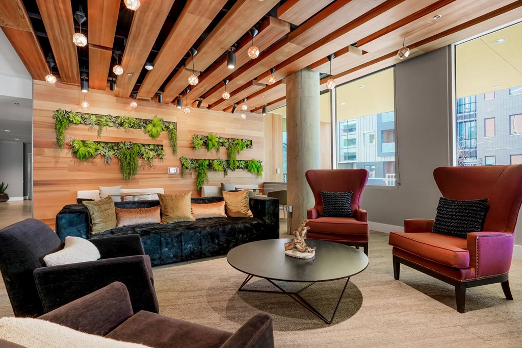 a room filled with furniture and a large window