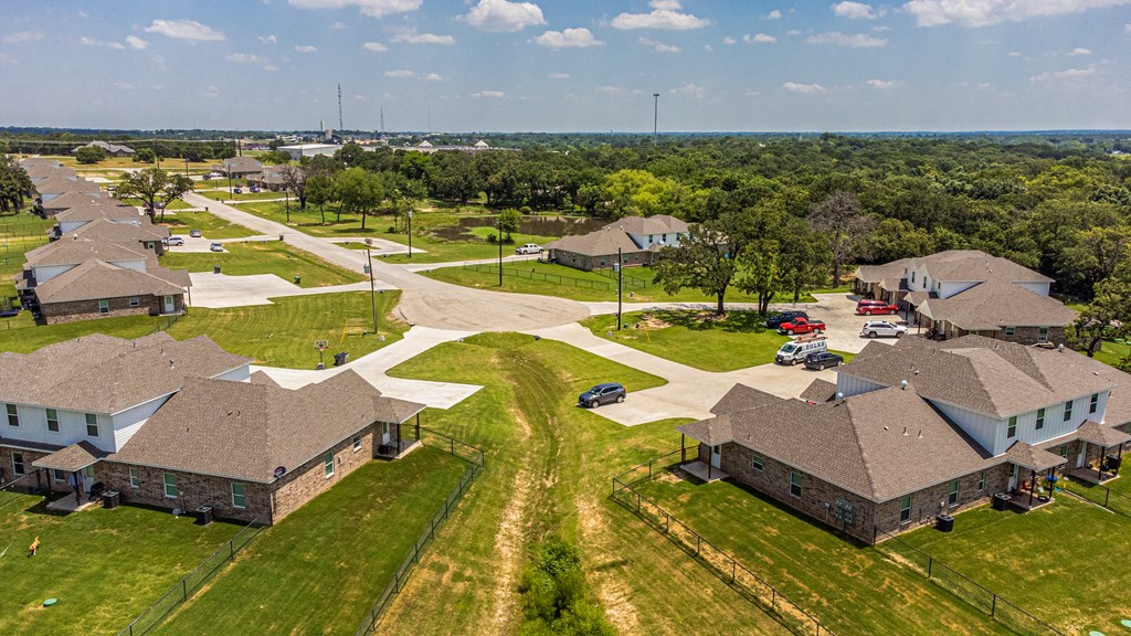 an aerial view of a neighborhood of houses