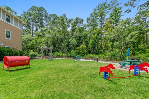 Leash-free dog park providing a fun space for pets at The Sanctuary at 331, a pet-friendly community