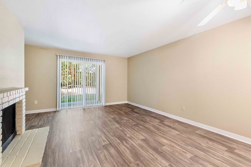 Saratoga Apartments in Everett, WA photo of living room with large window - Photo Gallery