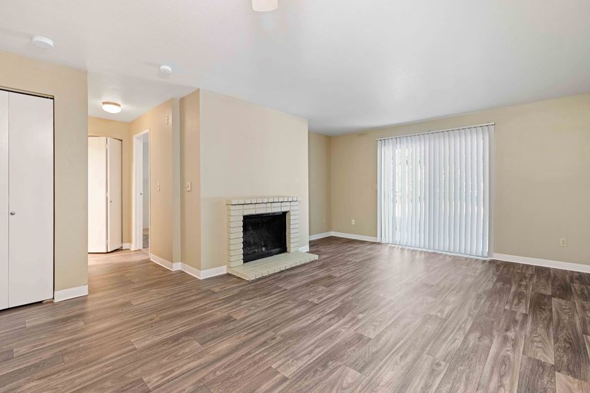 Saratoga Apartments in Everett, WA photo of living room with hardwood flooring - Photo Gallery