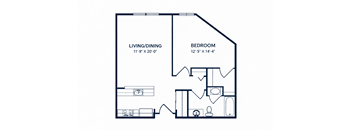 A floor plan of a room with a living/dining area and a bedroom.