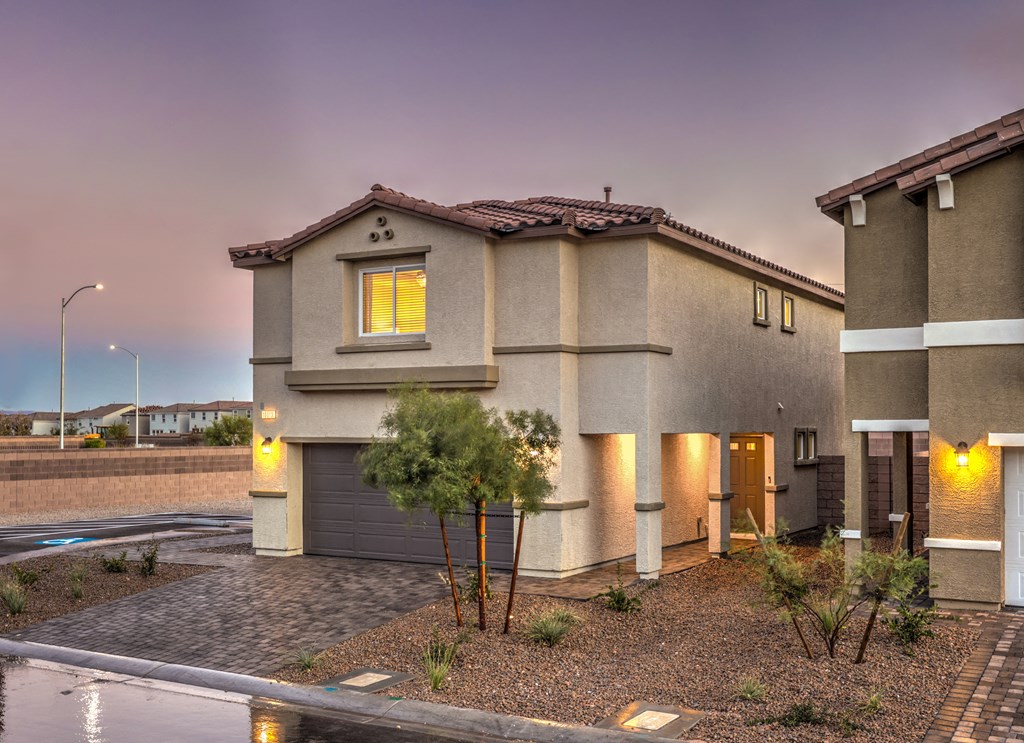 Mountain's Edge, NV, Single Family Homes - Shadow Bay - Exterior Street View Of Shadow Bay Two-Story Home with Professional Landscaping.