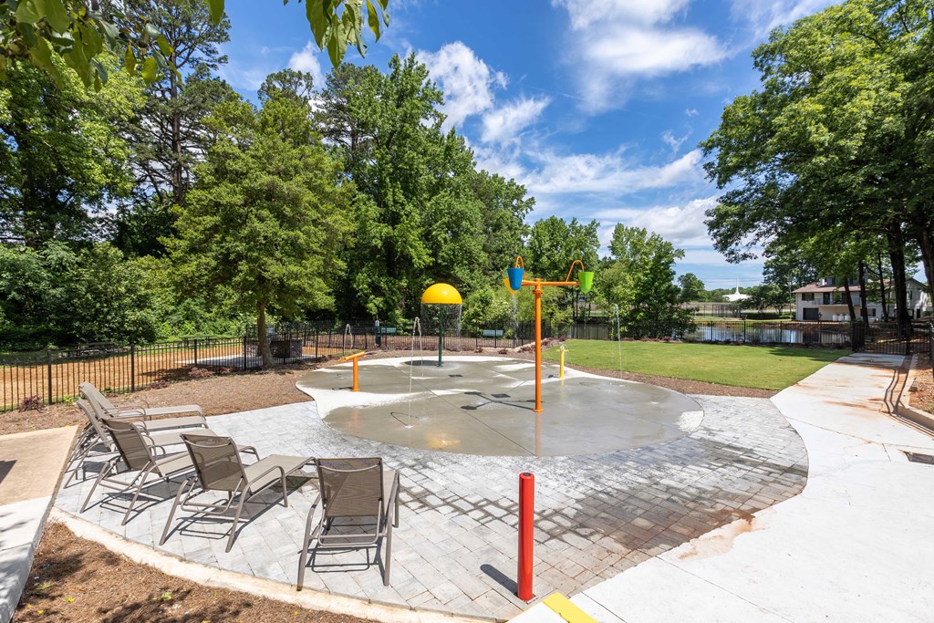 All-new splash pad at Somerset Apartments, a pet-friendly community near Charlotte and Huntersville, NC, featuring fun water features for residents to enjoy.