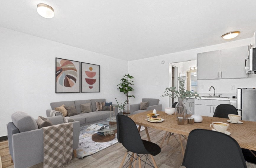 a living room and dining room with a table and chairs