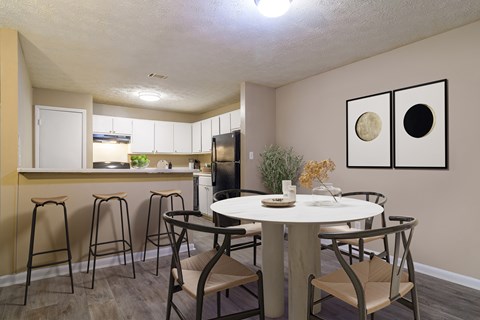 Spacious Dining room adjacent to the kitchen at Stratford Ridge, a pet-friendly community in Marietta, GA, near Smyrna