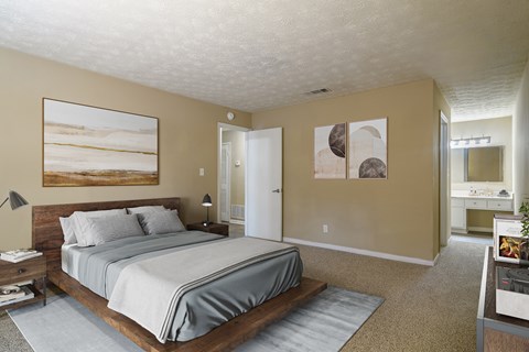 Generously sized bedroom offering plenty of space for furniture and comfortable living in a pet-friendly apartment at Stratford Ridge Apartments in Marietta, GA.