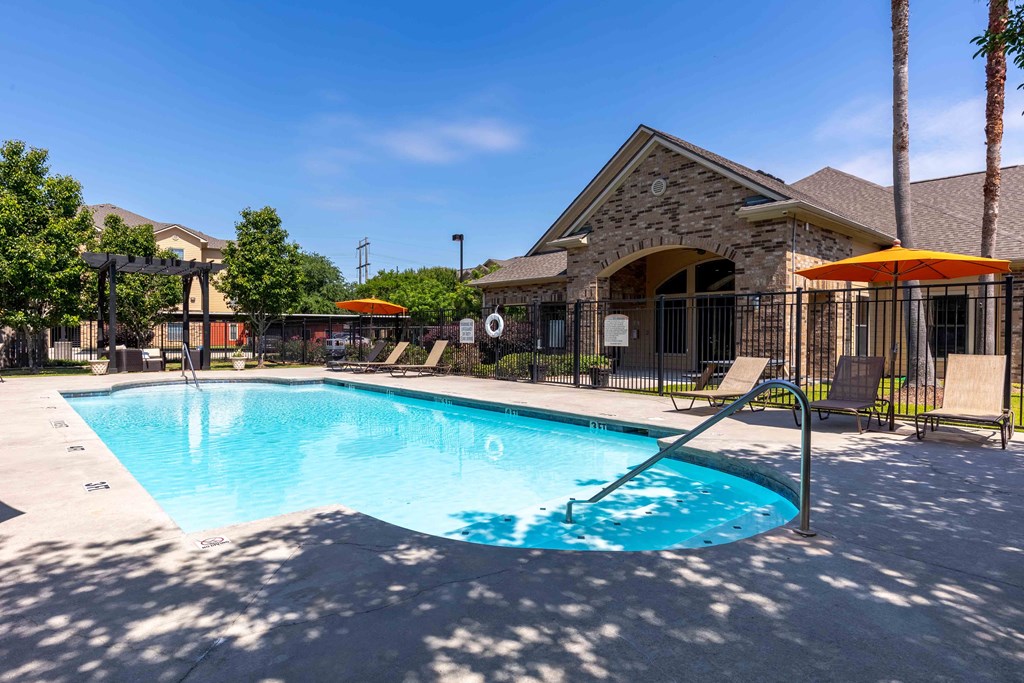 Sugar Mill Apartments in Addis, LA photo of a resort style swimming pool