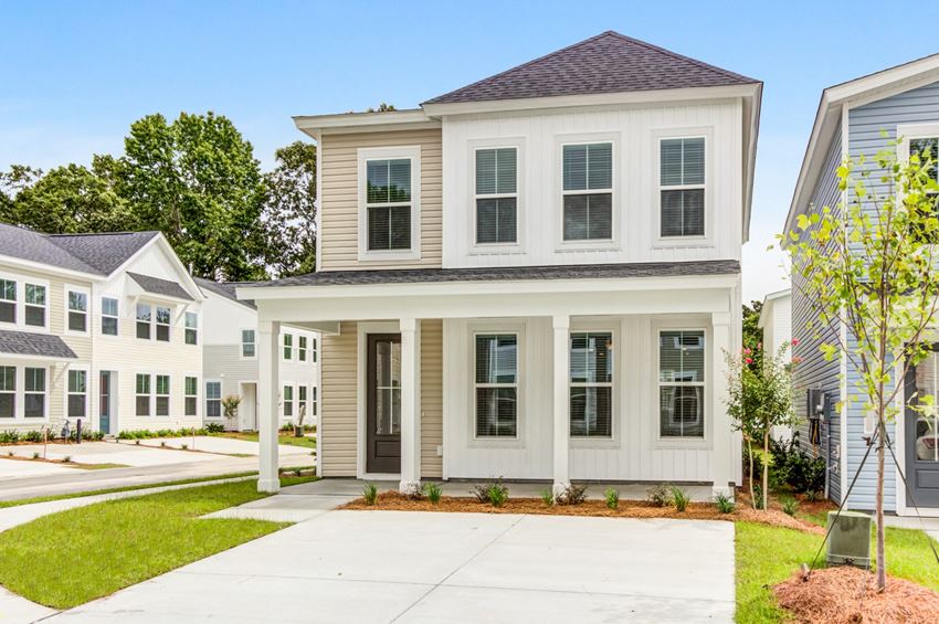 Townhouses for Rent in Park Circle SC - Sumner Village - Exterior View of Townhome with Private Driveway and Lush Landscaping - Photo Gallery 1