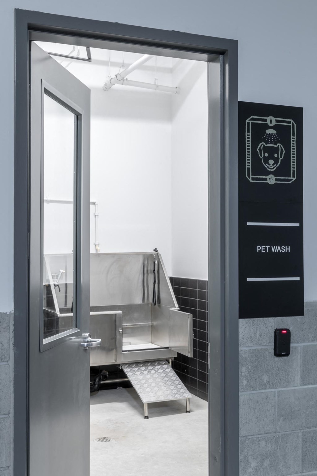 the door to the pet wash room is open
