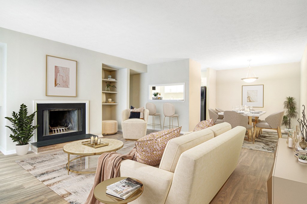 Affinitee at Stone Mountain Apartments photo of a living room with a couch and a fireplace