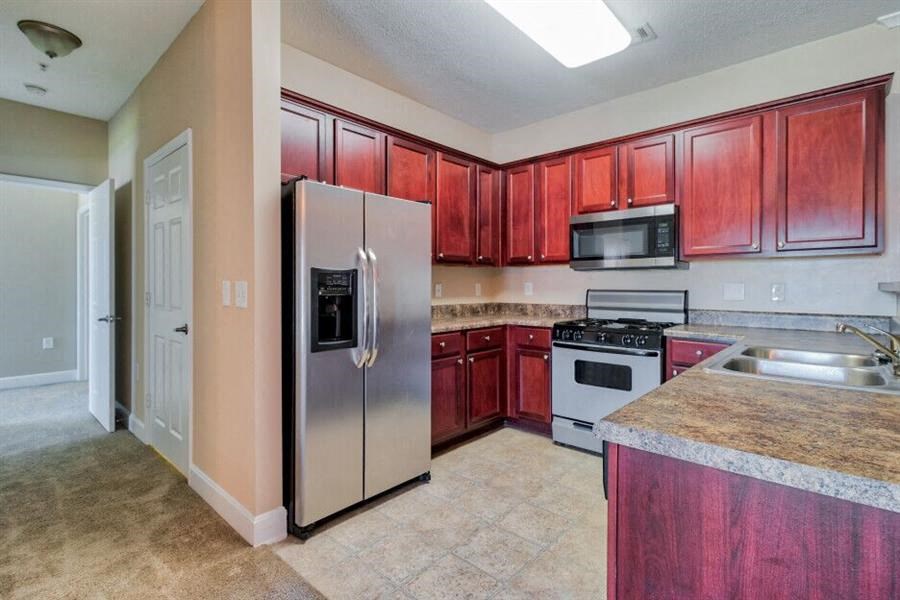 Oakridge, TN Apartments - Centennial Village - Luxury Kitchen with Stainless Steel Appliances