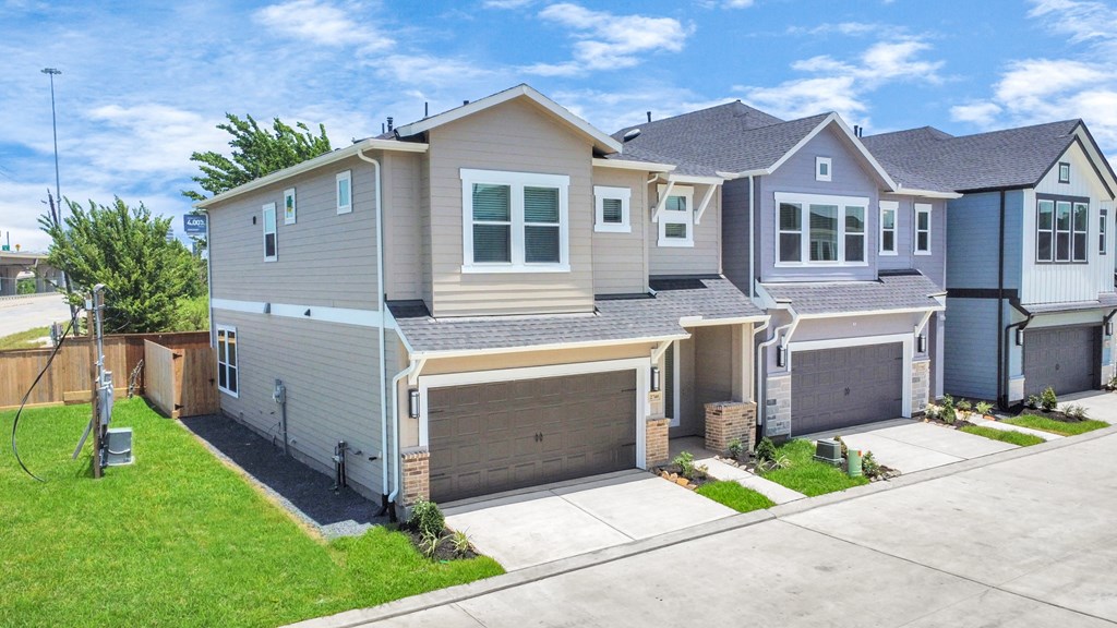 a house with two garage doors