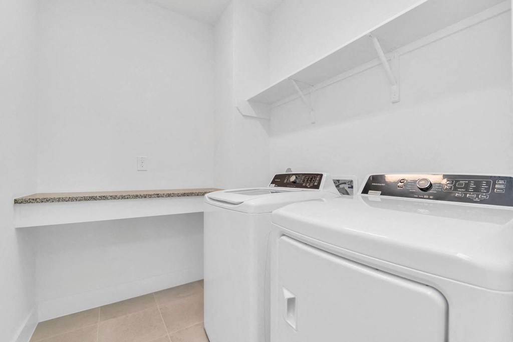 a washer and dryer in a laundry room
