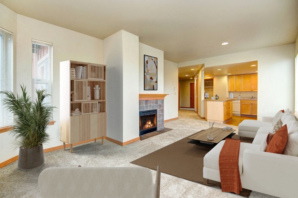 a living room with a fireplace and a couch