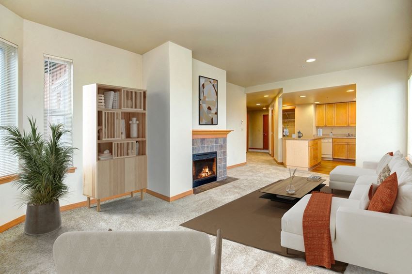 a living room with a fireplace and a couch - Photo Gallery