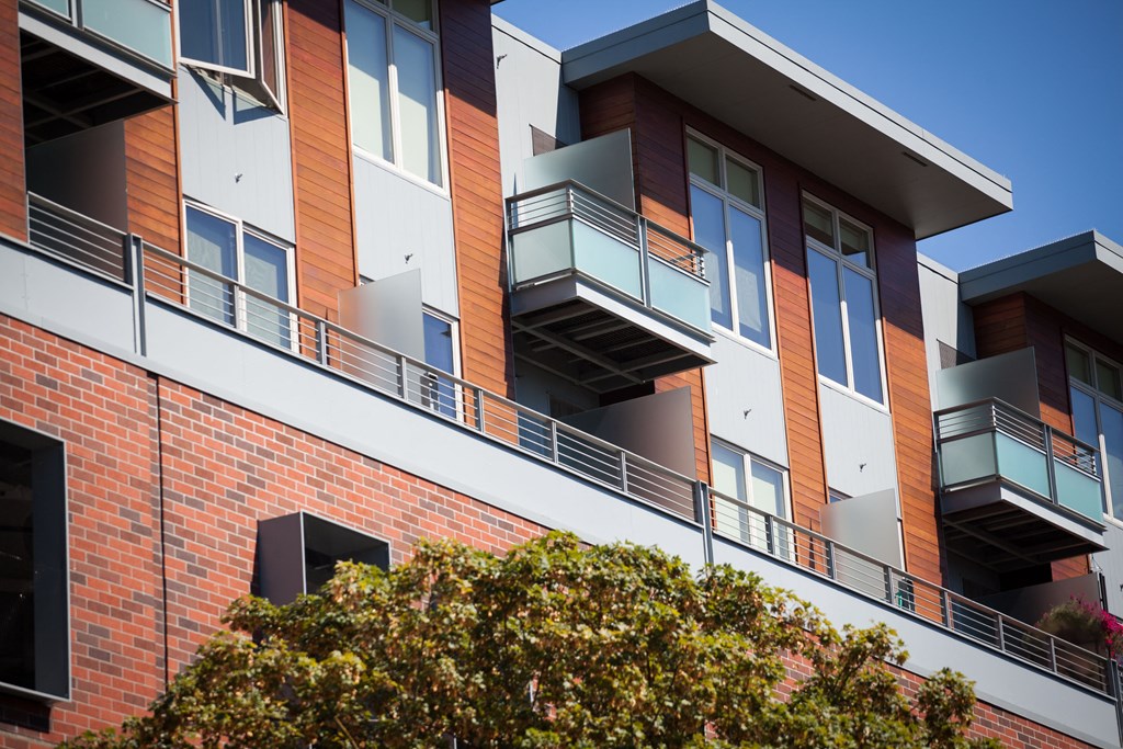an exterior view of an apartment building with balconies