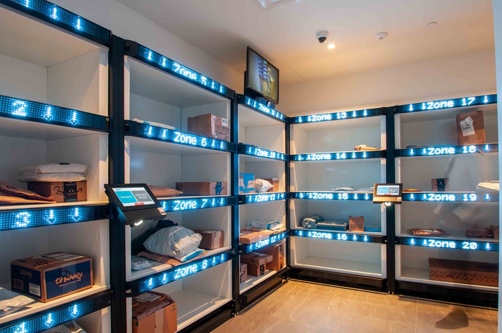 a room with many shelves and boxes in it