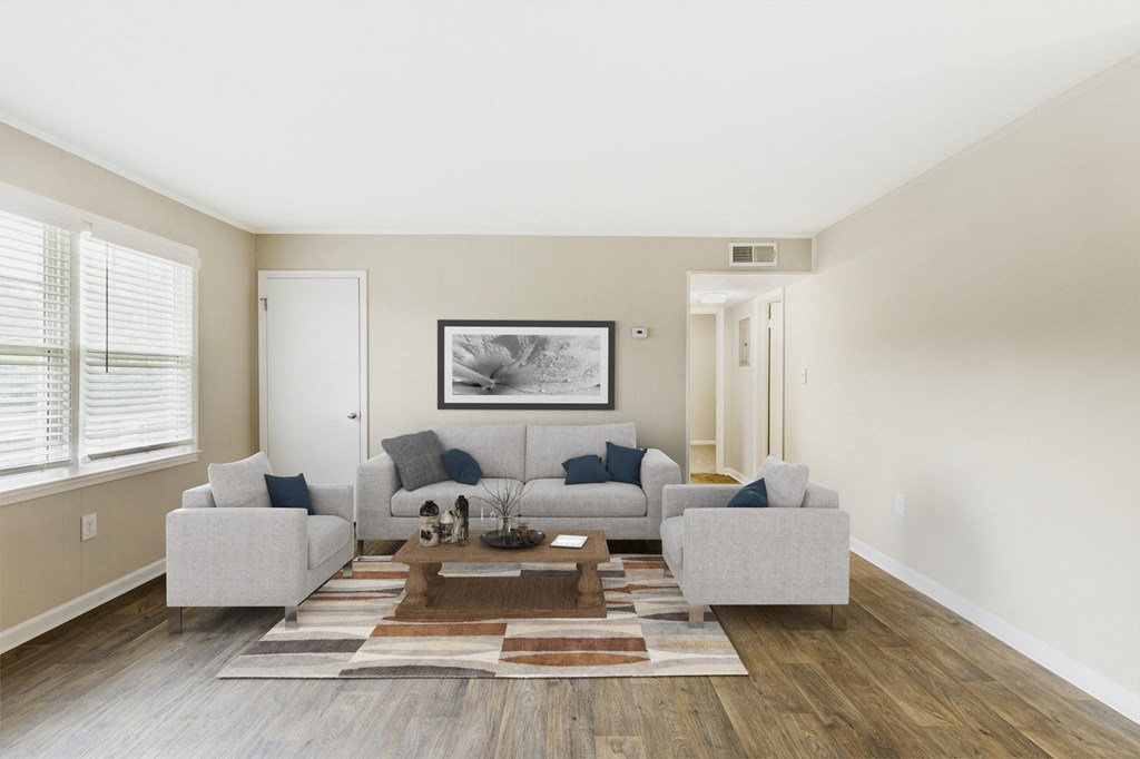 a living room with a couch and a coffee table