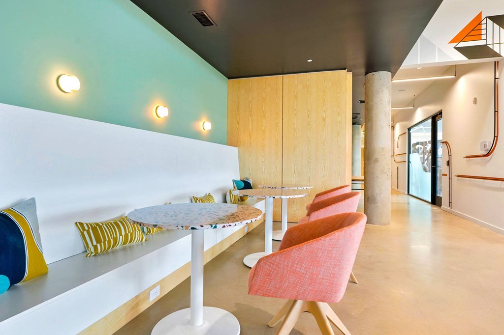 a room with a table and chairs