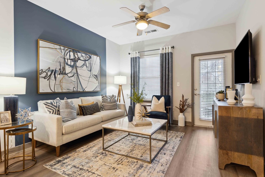 Sage at 1240 apartments in Mount Pleasant South Carolina photo of living room with hardwood floors and ceiling fan