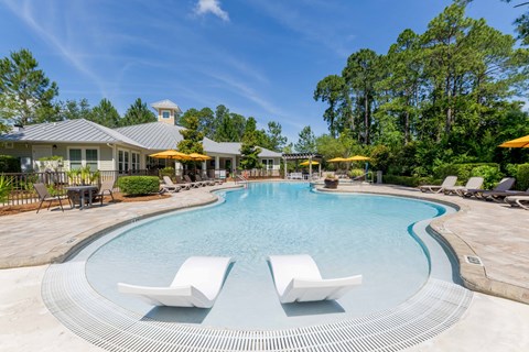 Resort-style swimming pool with lounge seatin at The Sanctuary at 331 in Santa Rosa Beach, FL