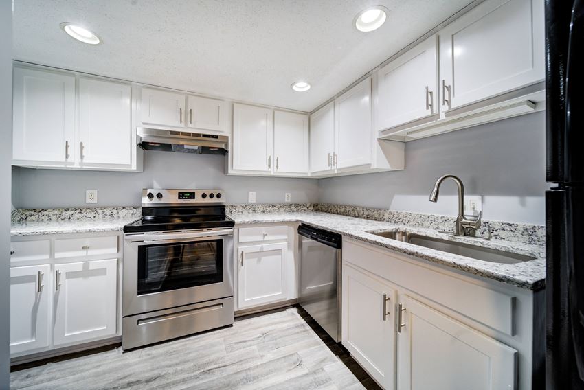 The Trails of North Hills apartments in Raleigh, NC photo of upgraded kitchen - Photo Gallery
