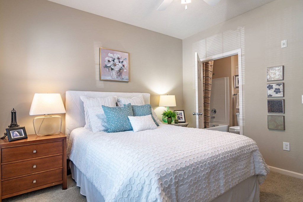 Apartments in Opelika for Rent – The Crossings of Opelika - bedroom with plush carpeting and ceiling fan