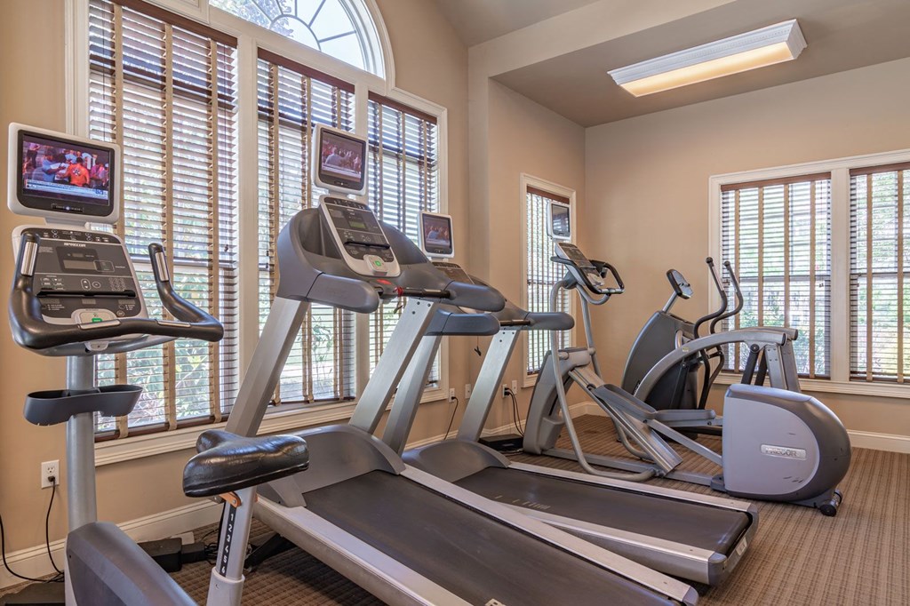 •	Apartments in Opelika for Rent – The Crossings of Opelika - fitness center with cardio equipment
