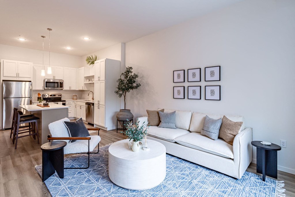 a living room with a couch and a table