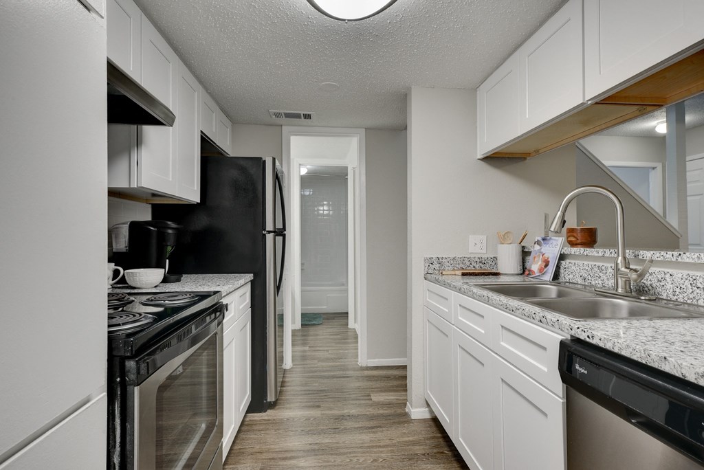 the preserve at ballantyne commons apartment kitchen with stainless steel appliances