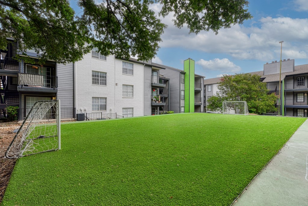 our apartments have a soccer field in front of our buildings
