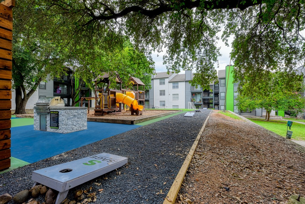 a playground and a play path in a park