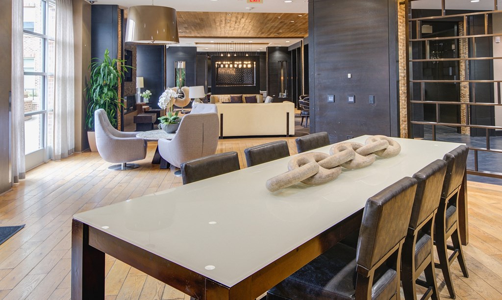 Resident lounge with conference table and chairs