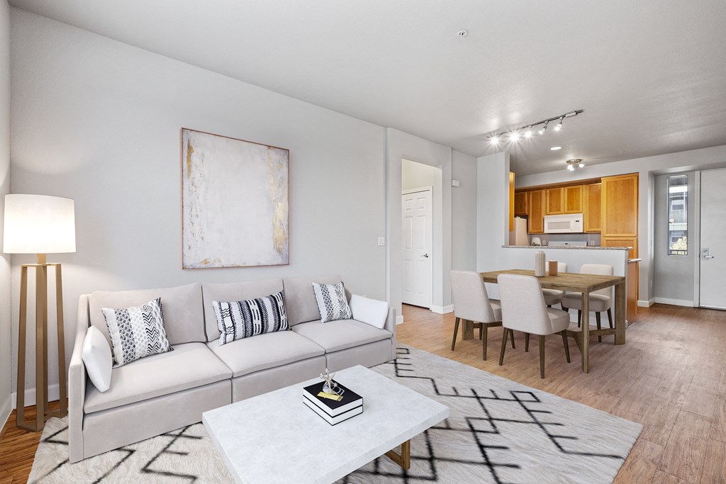 a living room with a couch and a table