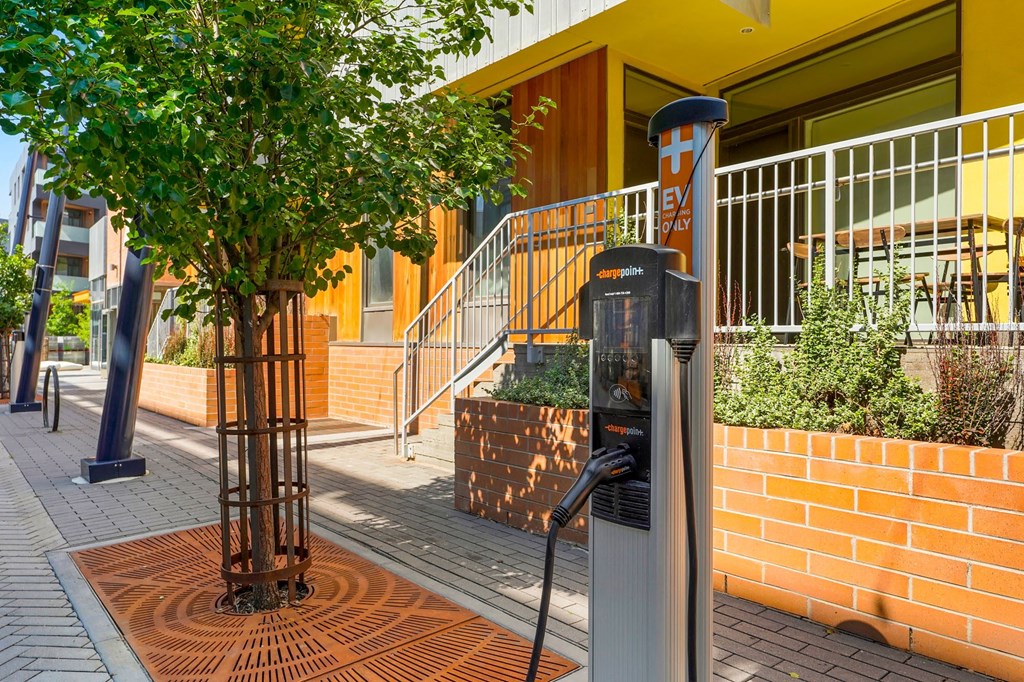 an electric car charger in front of a building