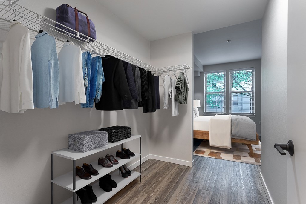 a walk in closet in a 555 waverly unit