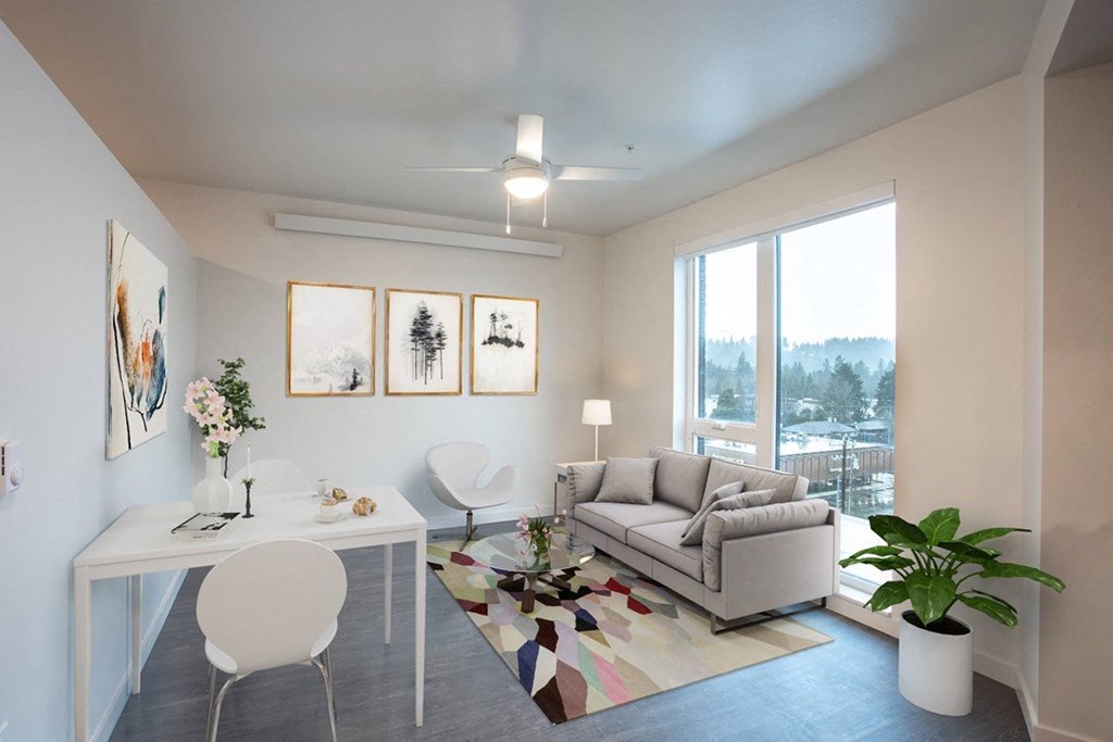 a living room with a couch and a table