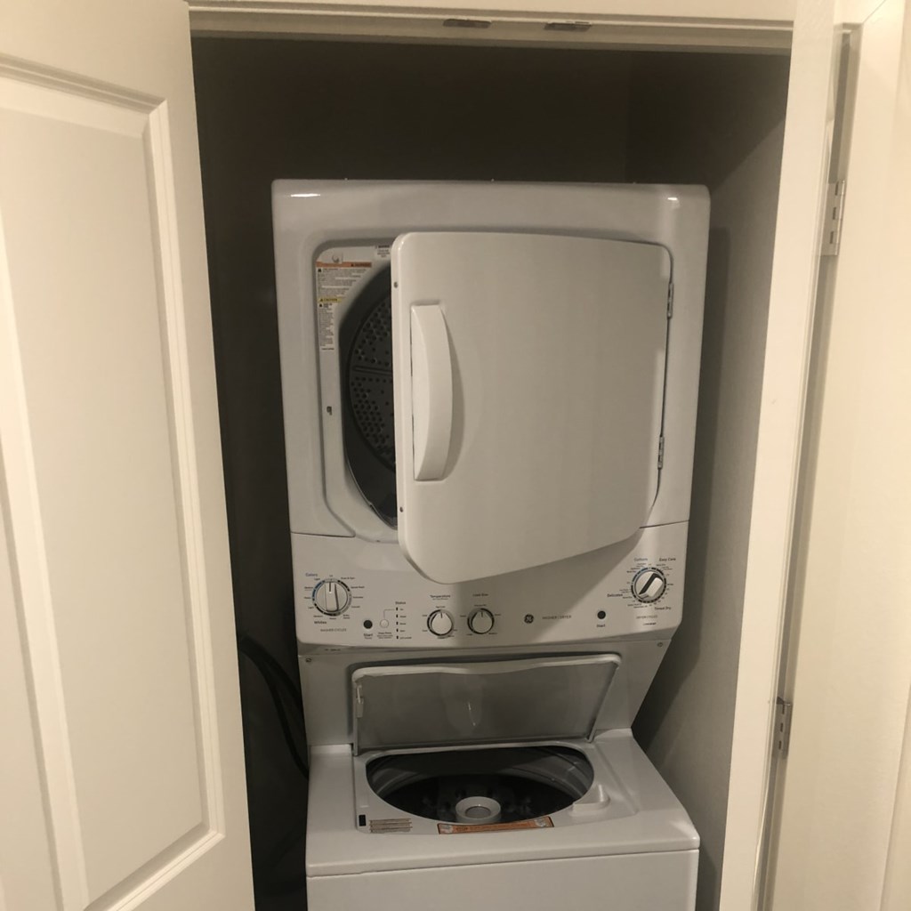 1 Bedroom Apartments in Downtown Phoenix, AZ - VB on 12th Street -  Stacked Washer and Dryer Inside Laundry Closet with Double Folding Doors.
