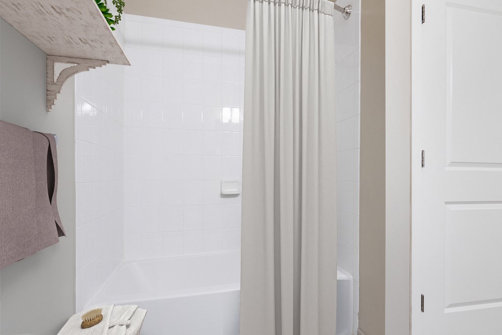 bathroom with tub shower