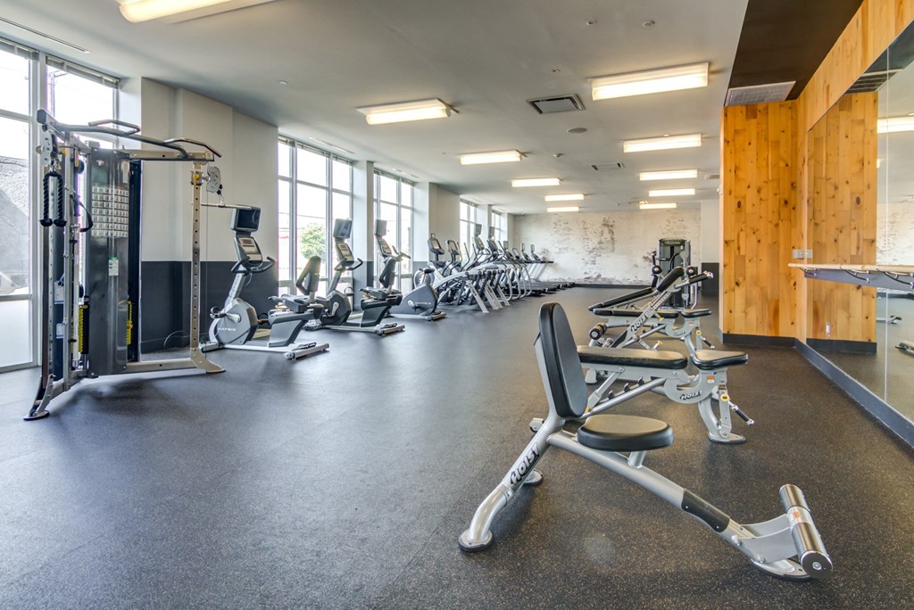 fitness center with cardio equipment