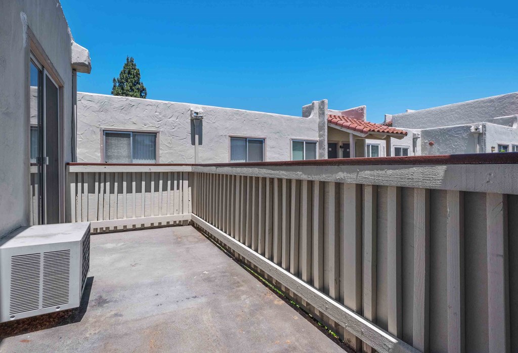 San Jose, CA Apartments For Rent - Village of Taxco - Large Balcony With Wood Ledge And AC Unit