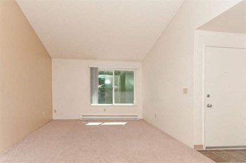 living room 2500 NE McWilliams Road 1-3 Beds Apartment for Rent - Photo Gallery 6