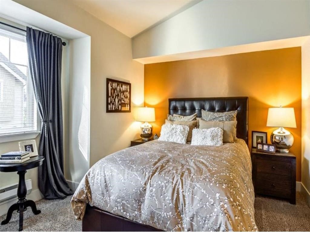 bedroom with accent wall