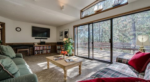 a living room with a couch and a television