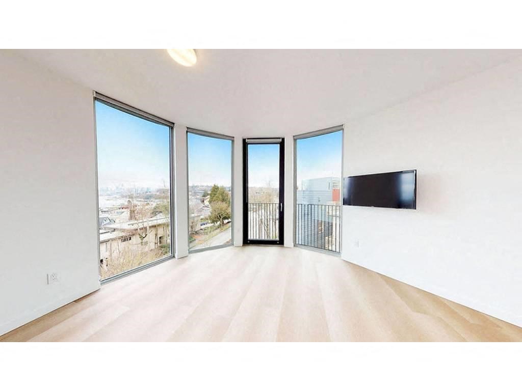 Living room with wood-style flooring