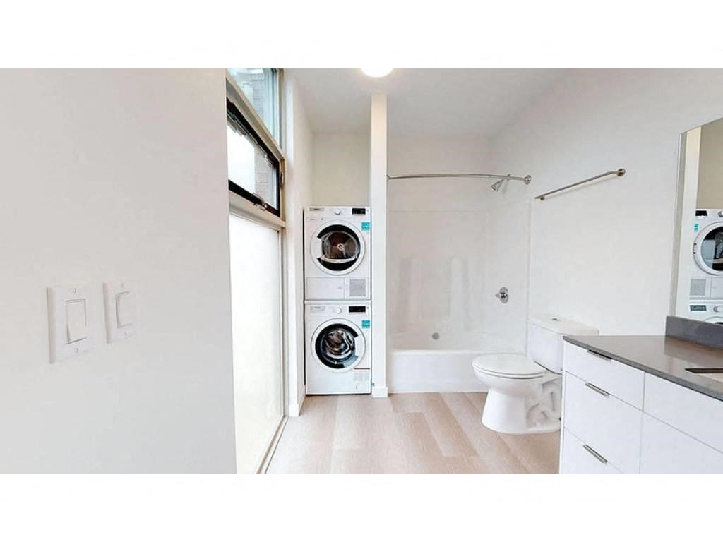 Bathroom with wood-style flooring