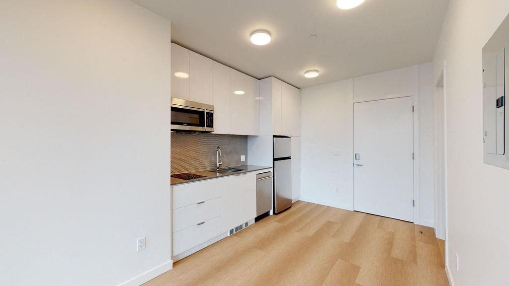 Kitchen with wood-style flooring